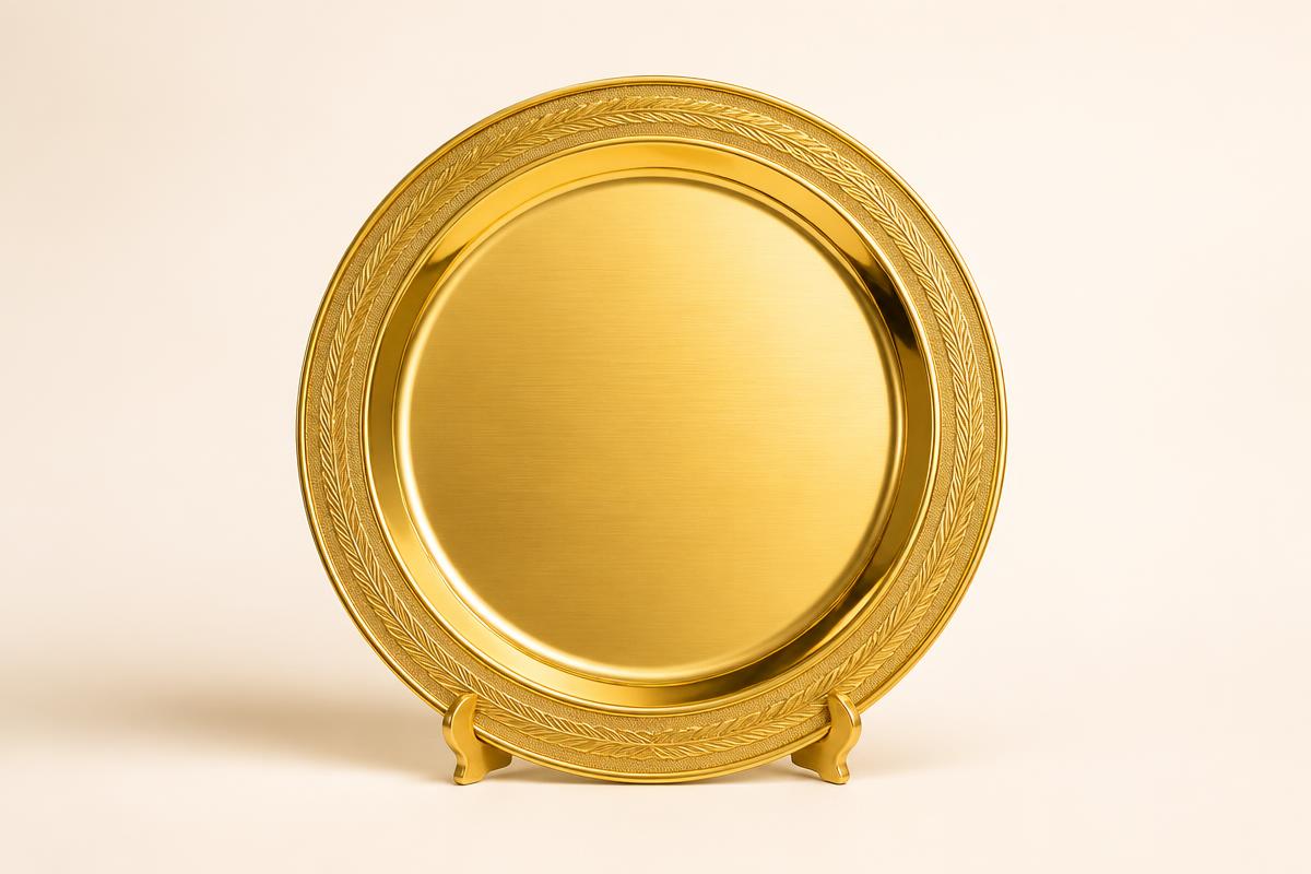 A polished empty gold plate displayed like an award trophy